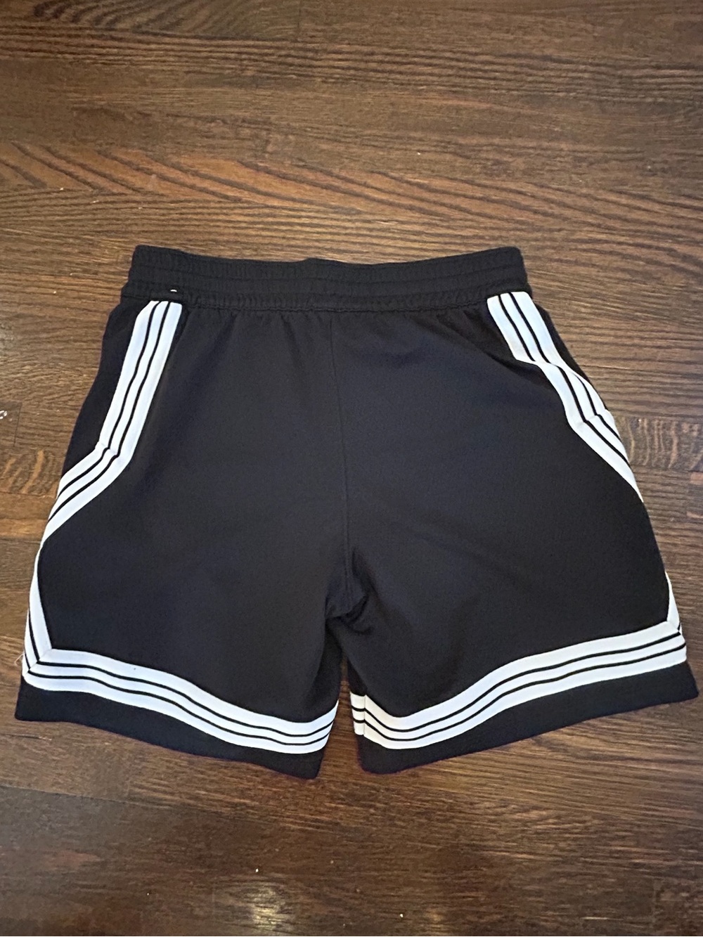 Nike Black Men’s Athletic Shorts with White Stripe Accents - Picture 3 of 3